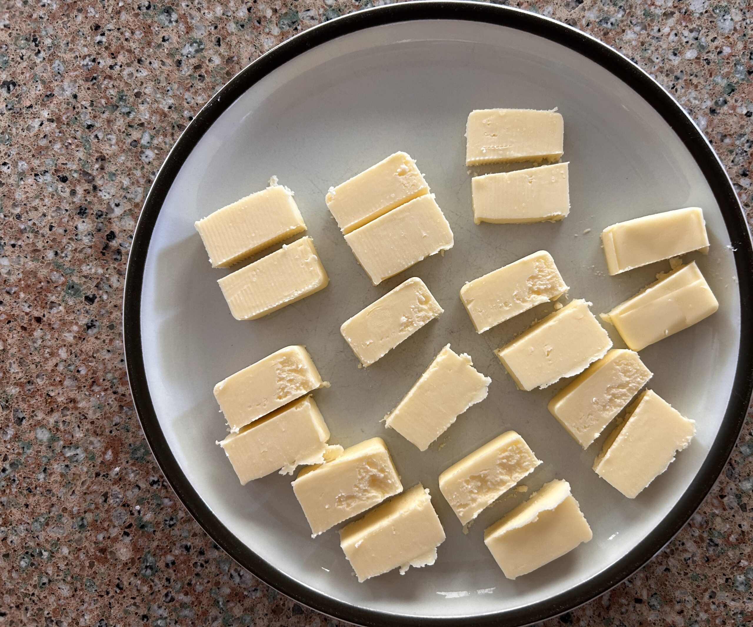 Cubed butter on a plate